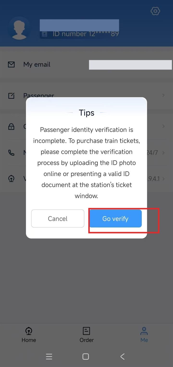 12306 Tips popup saying passenger identity verification is incomplete with Cancel and Go verify buttons