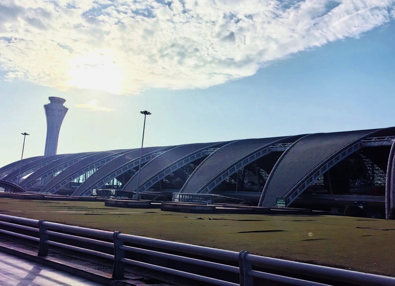 The arched terminal roof and control tower of Chengdu Shuangliu International Airport (CTU).