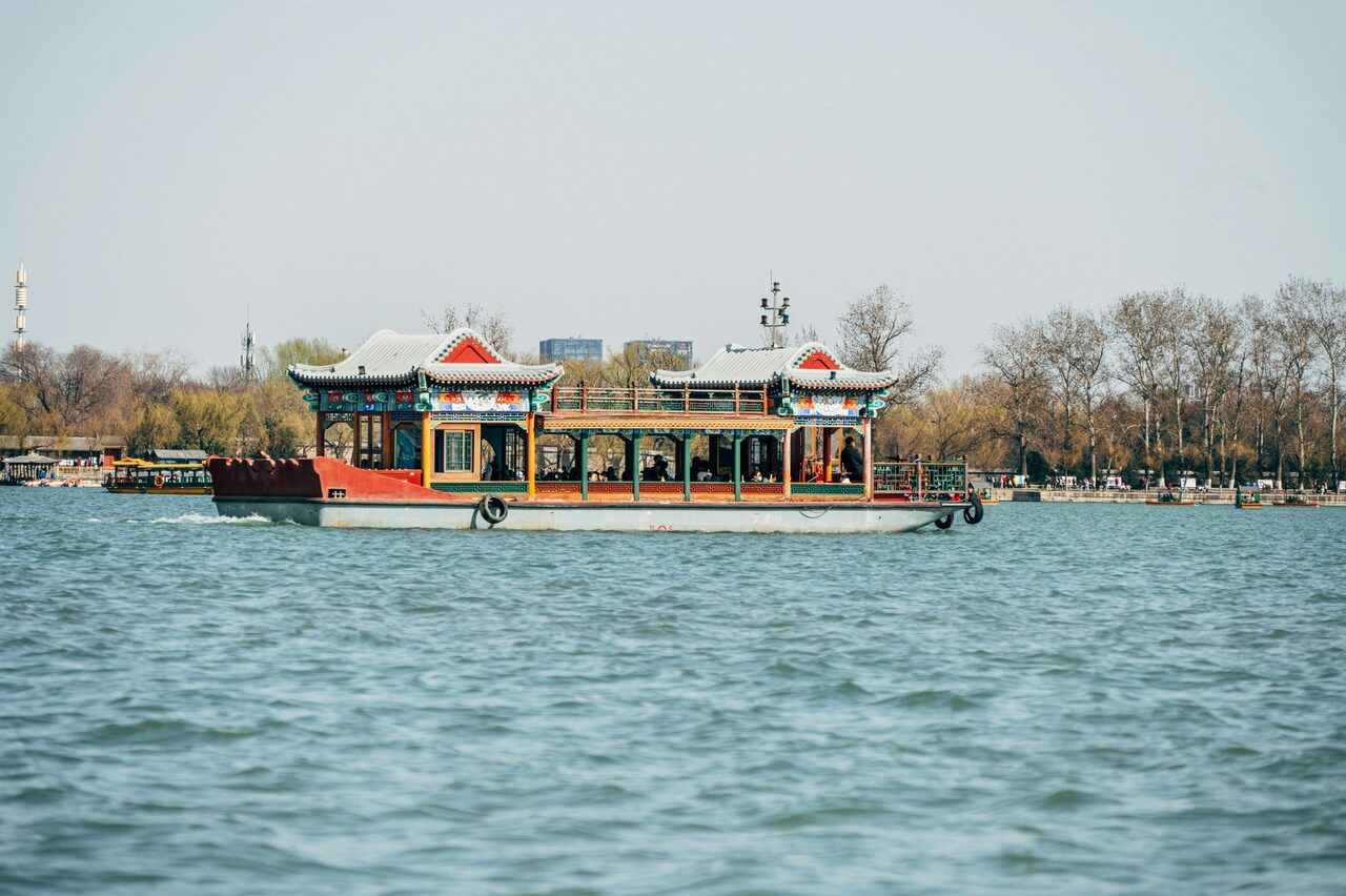 Summer Palace (Yiheyuan) pavilions reflected in Kunming Lake, Beijing.