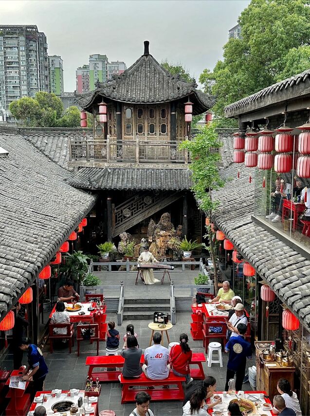 Locals drinking tea in a traditional Sichuan teahouse, Chengdu.