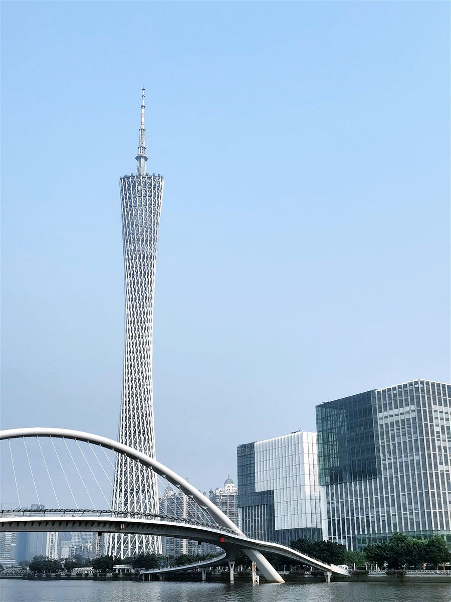 Canton Tower and the harp-shaped Haixin Bridge over the Pearl River in Guangzhou.