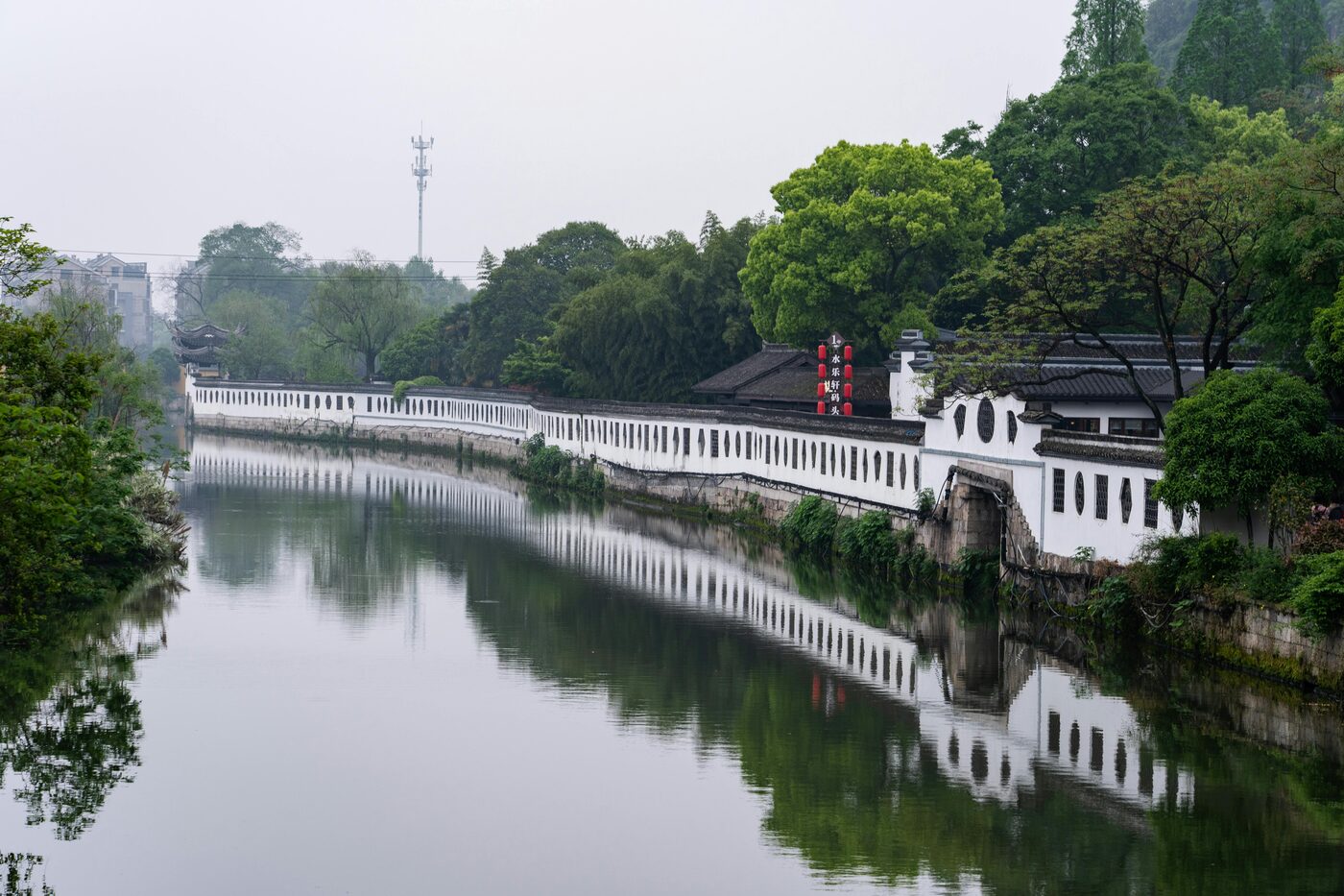 The Grand Canal in Hangzhou — historic stone bridge and waterside buildings on the canal.