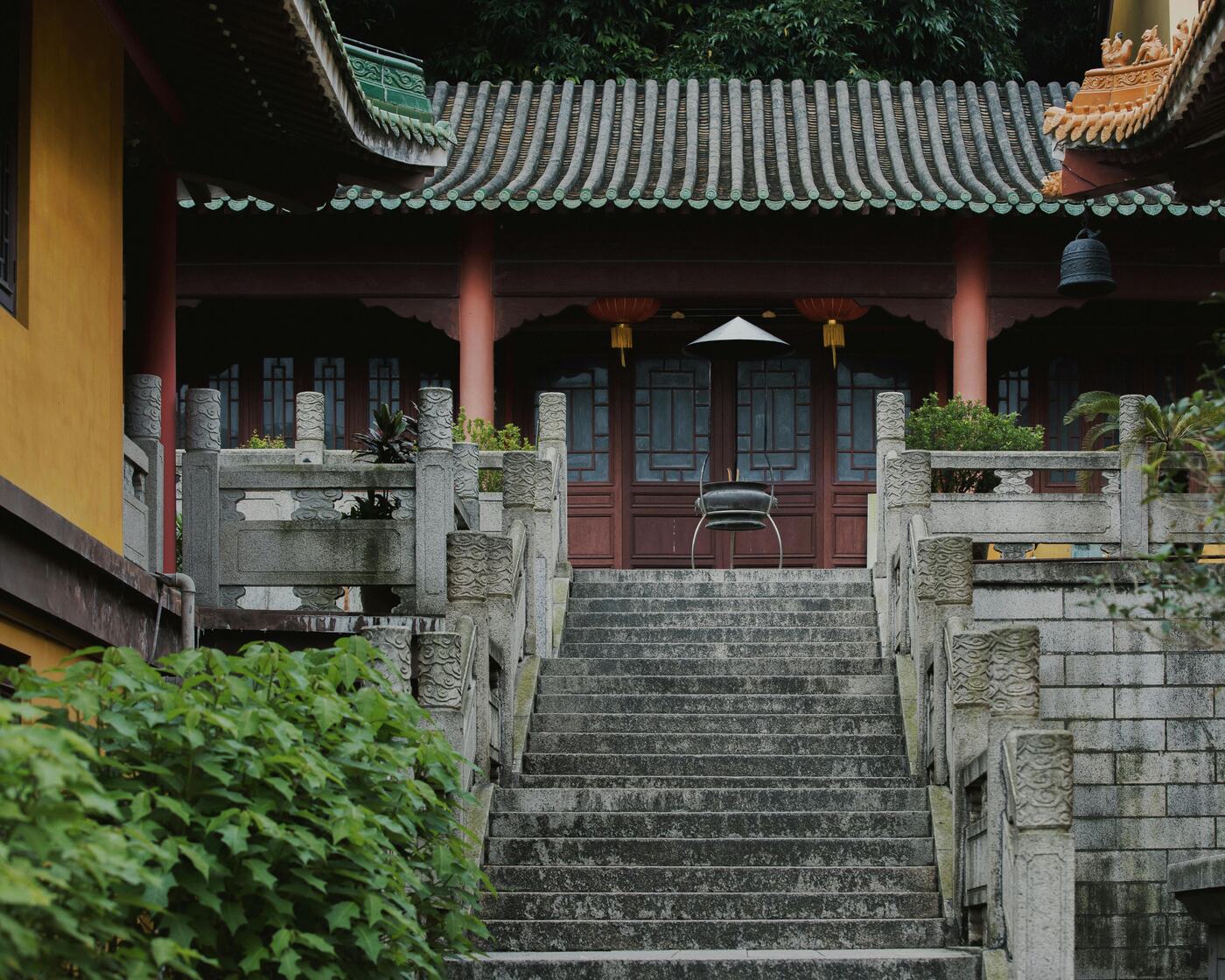 Lingyin Temple in Hangzhou — temple halls and trees in a forested valley west of West Lake.