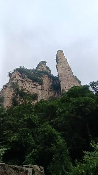 Golden Whip Rock (金鞭岩), the tall whip-shaped pillar, with the Divine Eagle rock beside it — Golden Whip Stream, Zhangjiajie