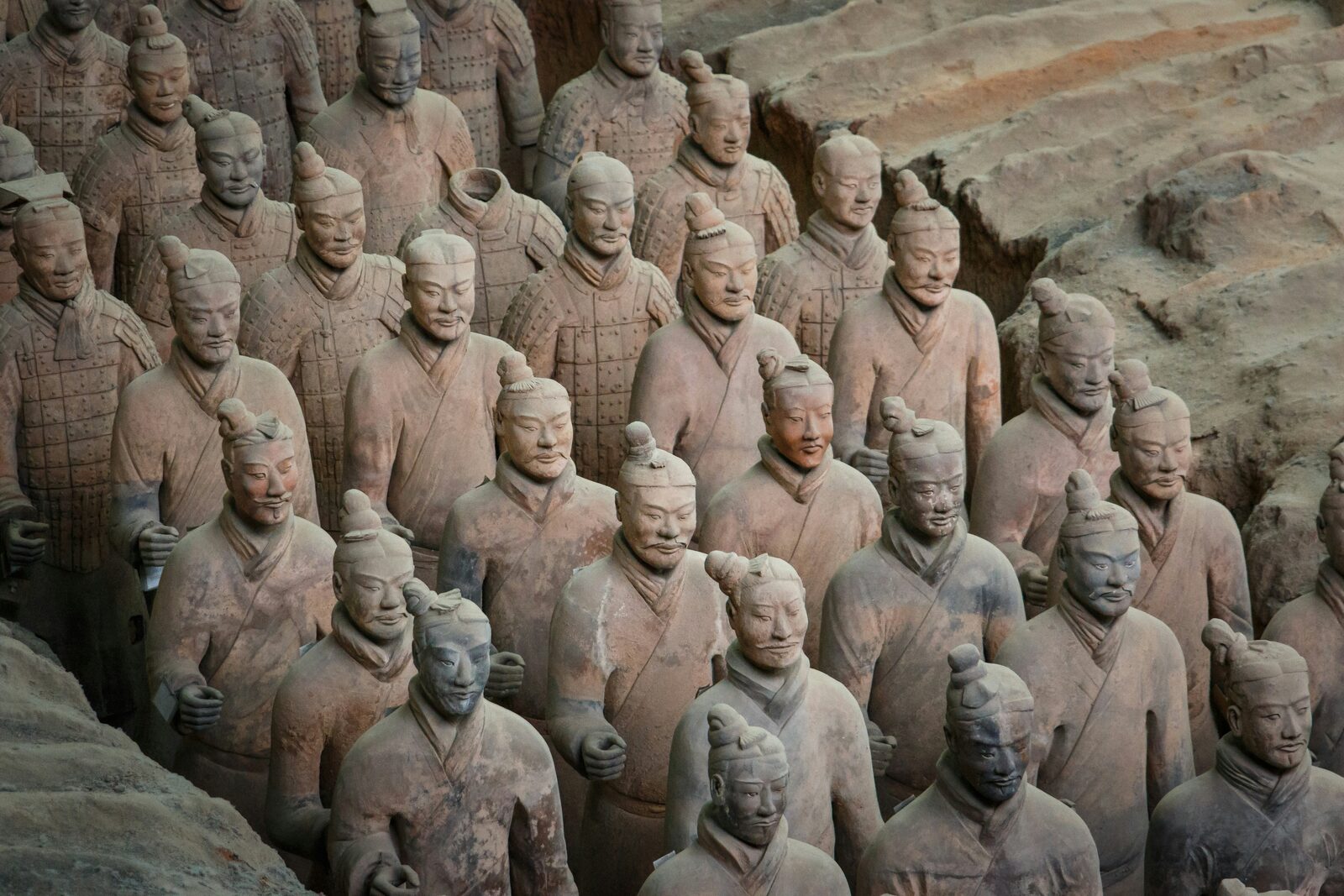 Rows of life-sized Terracotta Warriors at the excavation pit near Xi’an.