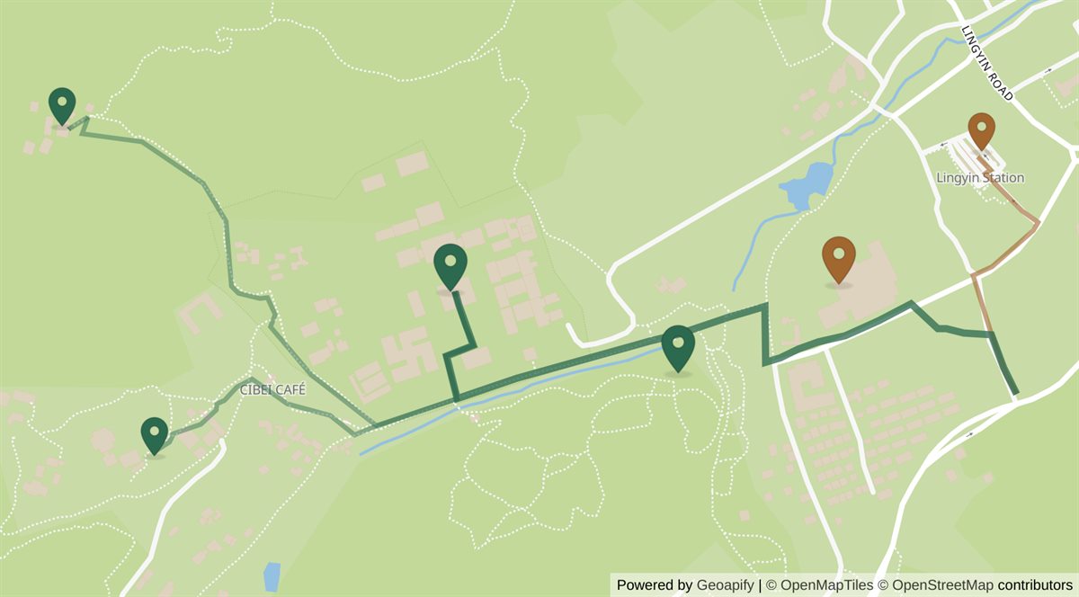 Map of the Lingyin and Feilai Feng scenic area in the hills west of Hangzhou. The valley runs from east to west and visitors walk up it. Buses and taxis stop at the eastern end: bus 7 terminates at Lingyin bus station in the top right, a five-minute walk from the road entrance. From the main gate and visitor centre the path runs west along a stream for about a kilometre, passing the Feilai Feng rock carvings on the way, and ends at Lingyin Temple's halls. Yongfu Temple lies 600 metres further west along the valley floor, and Taoguang Temple 900 metres from Lingyin up the hillside to the north-west. All four — the carvings, Lingyin, Yongfu and Taoguang — are covered by the same free timed reservation, which admits you only once.