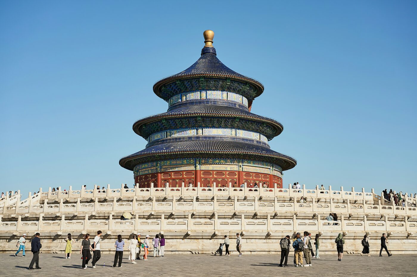 Cypress-lined avenue inside the Temple of Heaven park in Beijing, a gathering place for morning exercise.