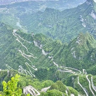 The 99-bend Tongtian Avenue spiralling up the south face of Tianmen Mountain.