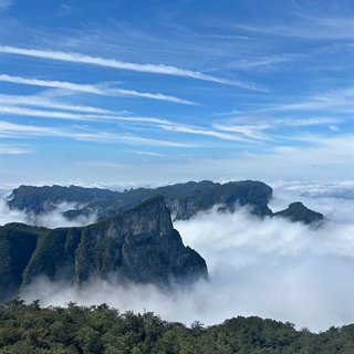 Sea of cloud over the peaks seen from Yunmeng summit, the high point of Tianmen Mountain.